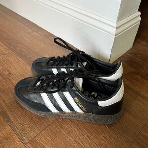 Black and white adidas spezial